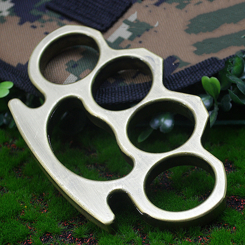 Tirapugni classico in ottone massiccio spesso
