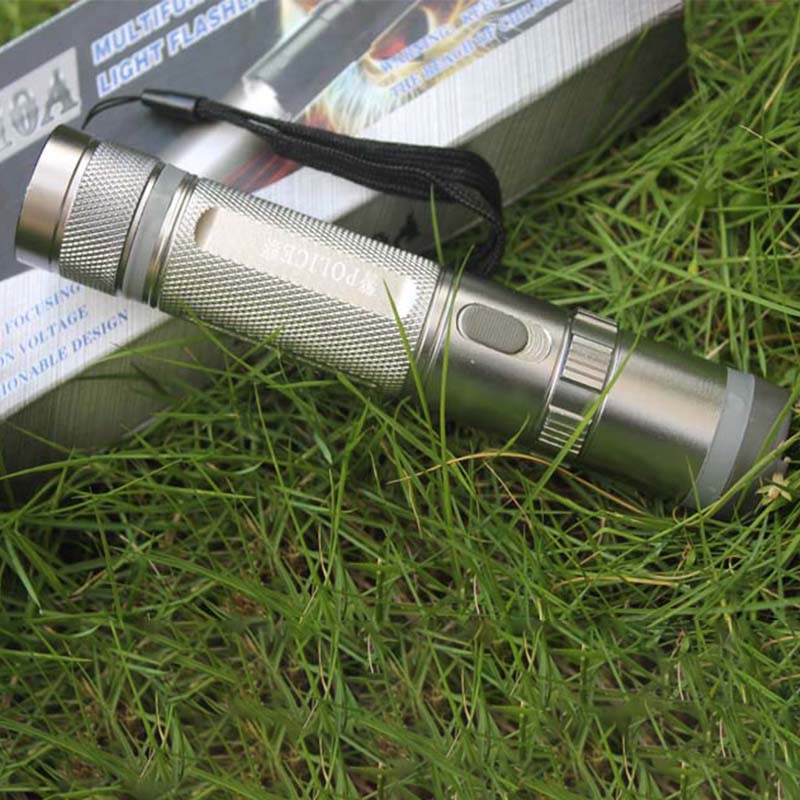 Lampe de poche multifonctionnelle d'auto-défense de bâton électrique à haute tension 910A