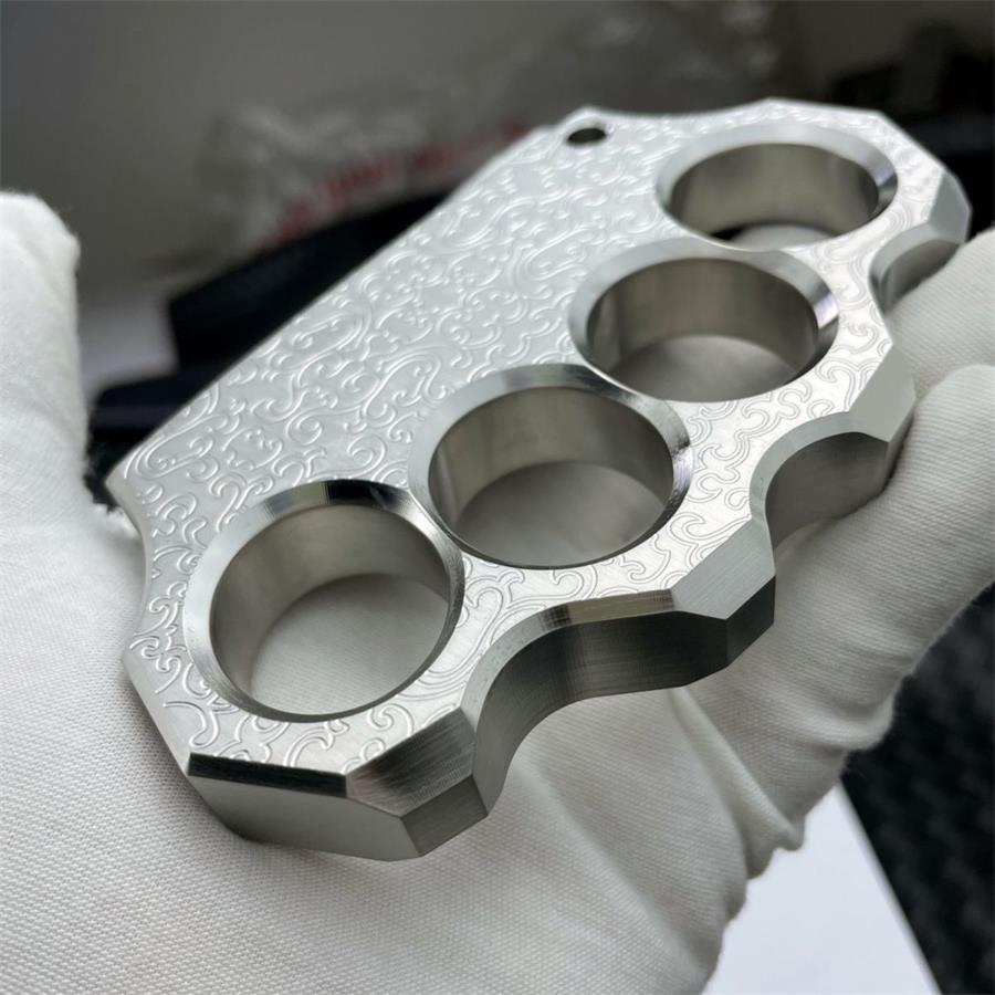 Thick Solid Steel Carved Knuckle Duster