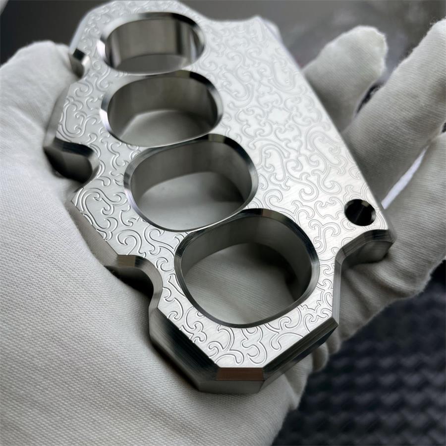 Thick Solid Steel Carved Knuckle Duster