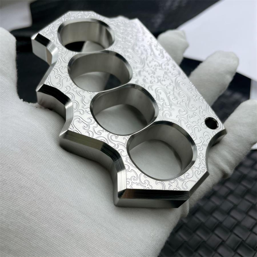 Thick Solid Steel Carved Knuckle Duster