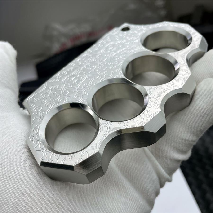 Thick Solid Steel Carved Knuckle Duster
