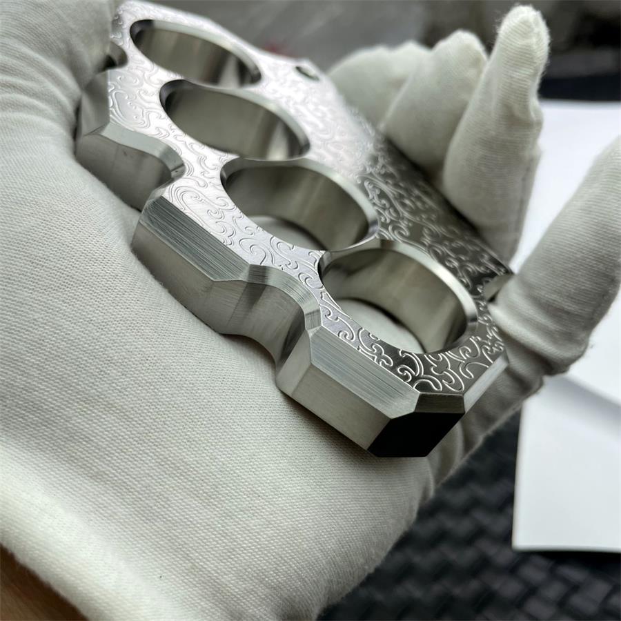 Thick Solid Steel Carved Knuckle Duster