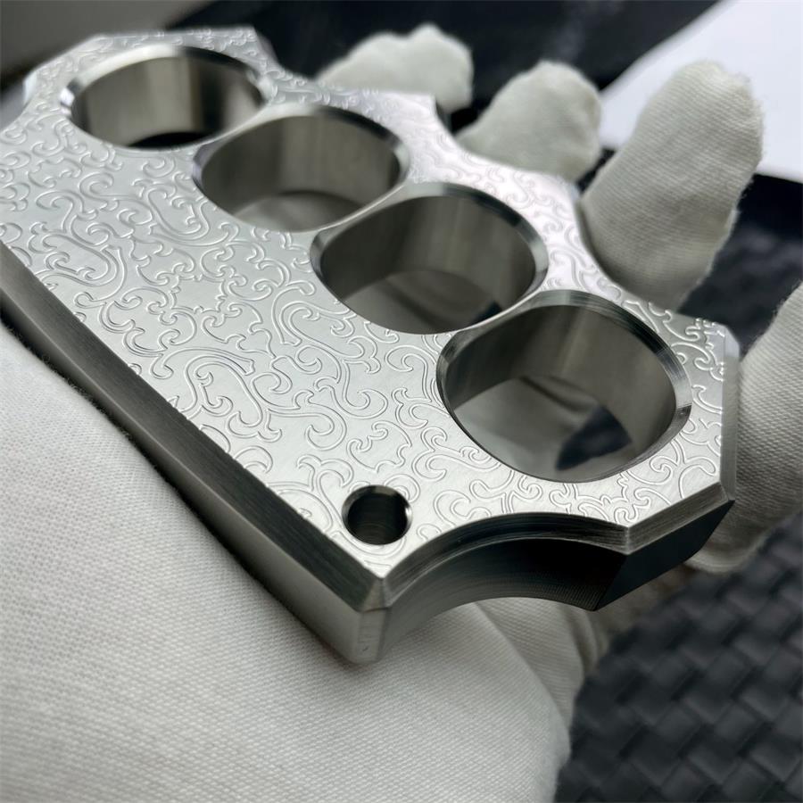 Thick Solid Steel Carved Knuckle Duster