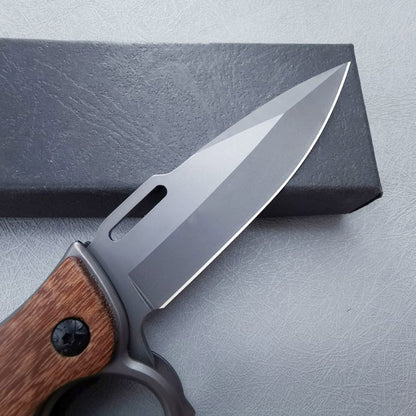 Couteau pliant poing américain manche en bois et manche en acier